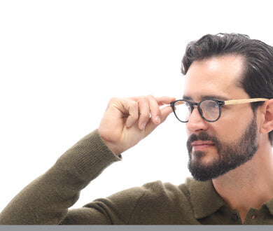 Man and woman wearing reading glasses