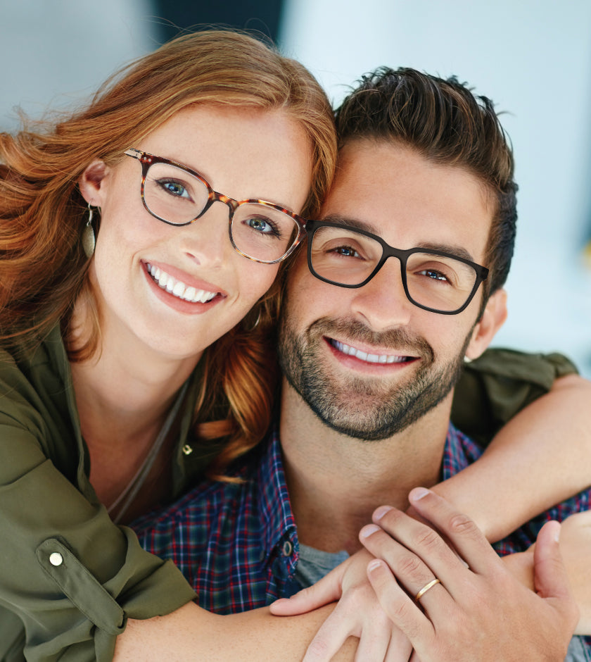 man and woman wearing glasses