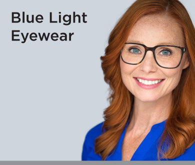 Man and woman smiling wearing blue light glasses