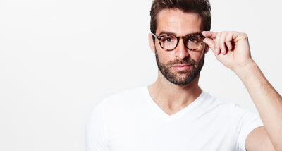 man with bear wearing flexible glasses